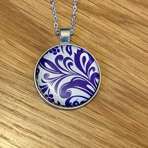 Hand made unique blue and white swirl pendant with 18” chain.